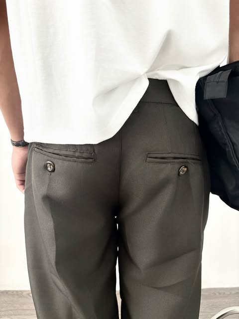 White shirt and grey trouser detail