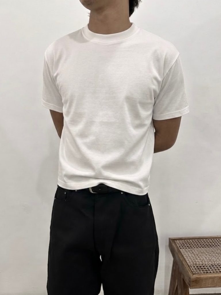 Classic Core Neutral White boxy T-shirt worn with dark trousers