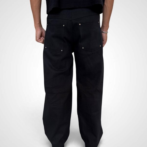 Ease Jet Black wide-leg denim worn with a black top